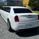 white Chrysler 300 luxury stretch limousine for weddings and events in Charlotte NC