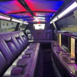 interior of Chrysler luxury stretch limousine with leather seating and ambient lighting